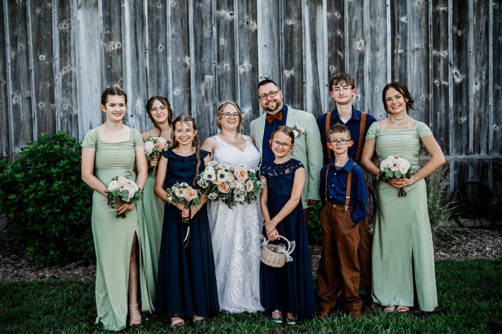 Paul Gibson II with his wife and seven children on their Missouri farm